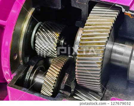 Detailed view of gears inside a mechanical device showing intricate design and functionality Detailed view of gears inside a mechanical device showing intricate design and functionality 127679032