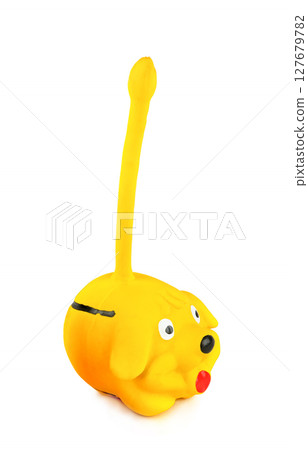 Small rubber dog (pet toy) isolated on white background. Small rubber dog (pet toy) isolated on white background. 127679782