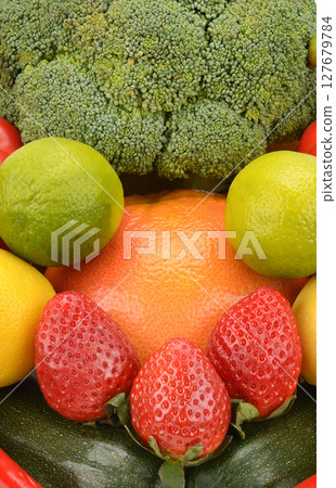 A set of fruits and vegetables. Bright background. A set of fruits and vegetables. Bright background. 127679784