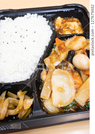 Delicious Chinese lunch box with eight treasures Delicious Chinese lunch box with eight treasures 127679882