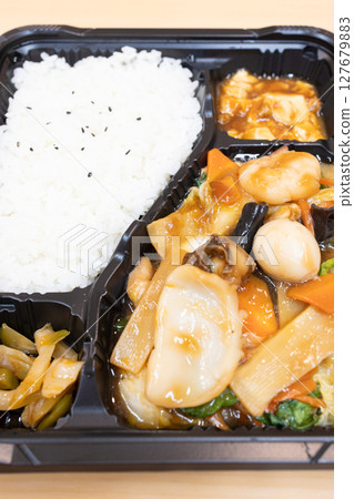 Delicious Chinese lunch box with eight treasures Delicious Chinese lunch box with eight treasures 127679883