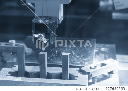 Operation of super drill EDM machine in the light blue scene. 127680363