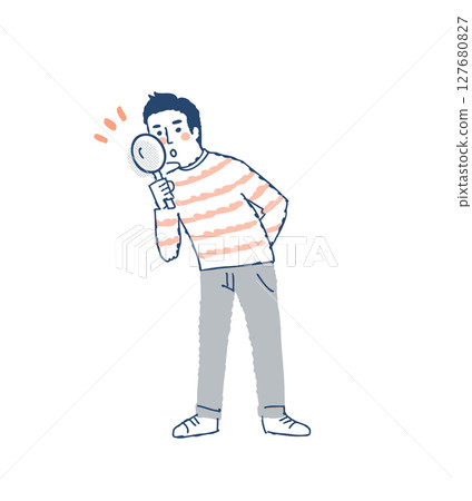 Young man looking into a magnifying glass Young man looking into a magnifying glass 127680827