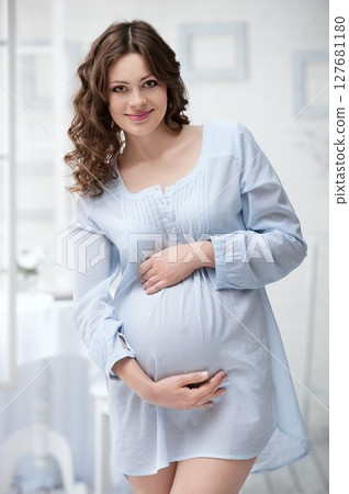 Portrait of the young pregnant woman 127681180