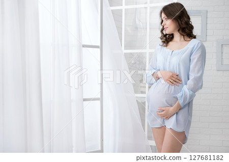 Portrait of the young pregnant woman Portrait of the young pregnant woman 127681182
