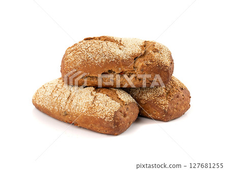 Whole wheat brown bread isolated, fitness pumpkin carrot buns with seeds, cereal bread 127681255