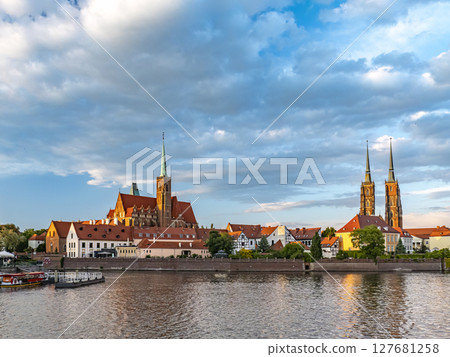 Stunning view of Collegiate Church of the Holy Cross, St Bartholomew under blue sky, Wroclaw, Poland Stunning view of Collegiate Church of the Holy Cross, St Bartholomew under blue sky, Wroclaw, Poland 127681258
