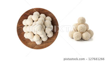 Coconut candies isolated, coco balls set. White truffle ball, indian ladoo or laddu with sweet cream Coconut candies isolated, coco balls set. White truffle ball, indian ladoo or laddu with sweet cream 127681266