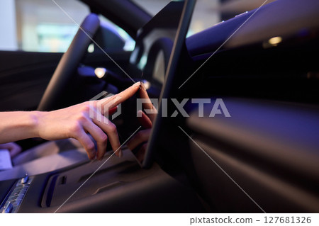 A modern car interior with advanced touchscreen controls enhances user experience and convenience A modern car interior with advanced touchscreen controls enhances user experience and convenience 127681326