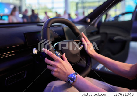 This modern car interior showcases a stylish and luxurious steering wheel and design This modern car interior showcases a stylish and luxurious steering wheel and design 127681346