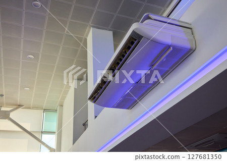 A modern air conditioning unit designed to fit seamlessly into a contemporary space A modern air conditioning unit designed to fit seamlessly into a contemporary space 127681350