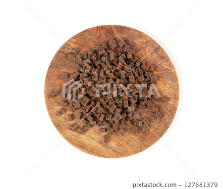 Mini bone-shaped pet food, small dogs crunchy treats, flavored brown dry kibble, canine food Mini bone-shaped pet food, small dogs crunchy treats, flavored brown dry kibble, canine food 127681379