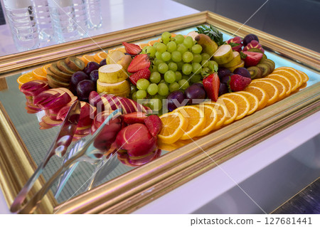An Elegant and Colorful Fruit Platter Featuring a Variety of Exquisite Exotic Fruits An Elegant and Colorful Fruit Platter Featuring a Variety of Exquisite Exotic Fruits 127681441