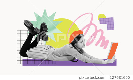 Girl lying on floor, reading book surrounded by graphic educational elements. Youth-focused visuals Girl lying on floor, reading book surrounded by graphic educational elements. Youth-focused visuals 127681690