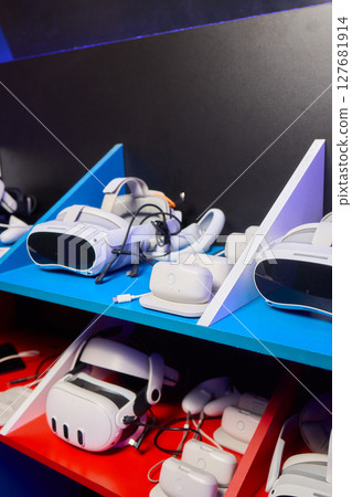 Futuristic Virtual Reality VR Headsets are prominently on display in a Tech Showcase event 127681914