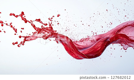 Splash of red liquid forming elegant wave motion on white background 127682012