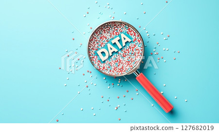 Magnifying glass focusing on word DATA among multicolored particles on blue background Magnifying glass focusing on word DATA among multicolored particles on blue background 127682019