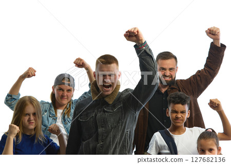 Group united in protest raising fists with determined facial expressions against white background Group united in protest raising fists with determined facial expressions against white background 127682136