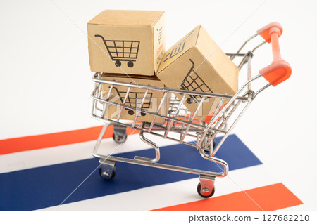 Thailand shopping, Shopping cart box on Venezuala flag, import export, finance commerce. 127682210