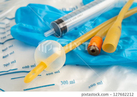 Foley catheter and urine drainage bag collect urine for disability or patient in hospital. 127682212