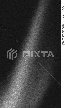 Abstract light and shadow pattern on noise textured dark surface 127682228