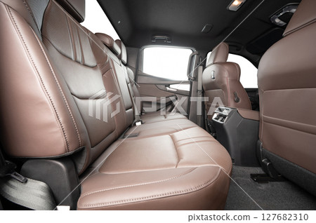 Empty leather back seat in pick up vehicle 127682310