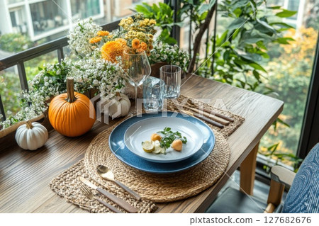 prepare thanksgiving Table with Pumpkins and Flowers for Family Gathering Concept 127682676