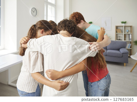School children group in common hug, pre-teens, teenagers diverse friends embrace greeting School children group in common hug, pre-teens, teenagers diverse friends embrace greeting 127683165