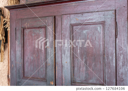 Old purple wooden rural closet background Old purple wooden rural closet background 127684106