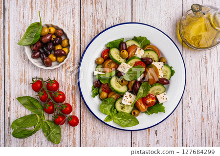 Greek salad with fresh vegetables 127684299