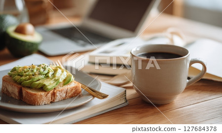 Business Casual Morning Setup with Laptop and Avocado Toast Business Casual Morning Setup with Laptop and Avocado Toast 127684378