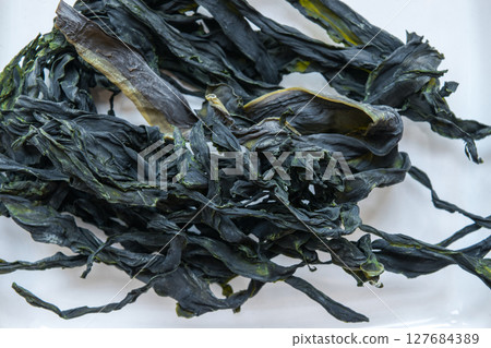 Seaweed in White Background Surface Close Up View Seaweed in White Background Surface Close Up View 127684389