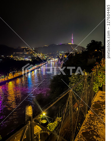 Panoramic view of the Kura river from a balcony with roses in Tbilisi. High quality photo Panoramic view of the Kura river from a balcony with roses in Tbilisi. High quality photo 127684465