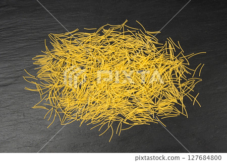 Raw vermicelli, gold soup pasta, small scattered homemade noodles, thin macaroni 127684800