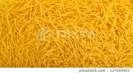 Raw vermicelli textured background, gold soup pasta pattern, small homemade noodles mock up 127684801