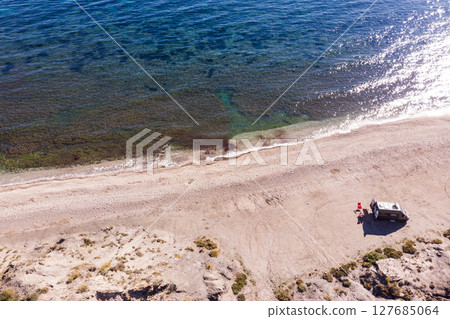 Caravan van on beach. Aerial view 127685064