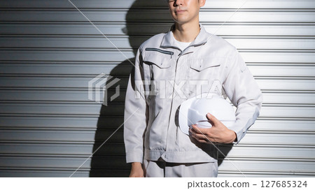 Men in work uniforms Men in work uniforms 127685324