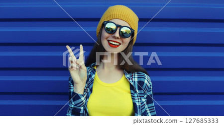 Stylish happy young woman in colorful clothes, cool modern teenage girl having fun Stylish happy young woman in colorful clothes, cool modern teenage girl having fun 127685333