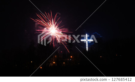 Colorful fireworks at holiday night 127685412