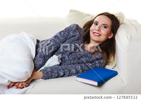 Woman taking power nap after lunch Woman taking power nap after lunch 127685512