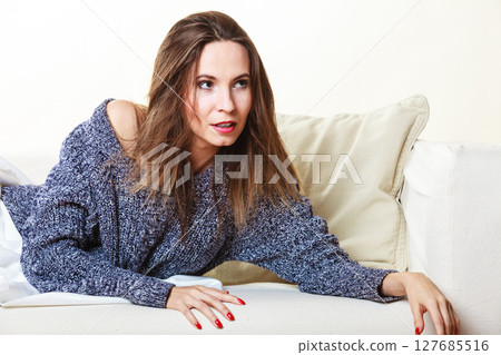 sensual woman relaxing on bed portrait sensual woman relaxing on bed portrait 127685516