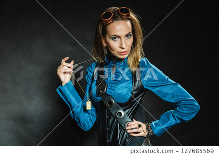 Steampunk retro girl portrait. 127685569