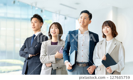 Teamwork image of four businessmen, men and women Teamwork image of four businessmen, men and women 127685759