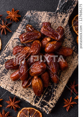 Dried tropical date fruit as an ingredient for fresh organic diet food 127686275