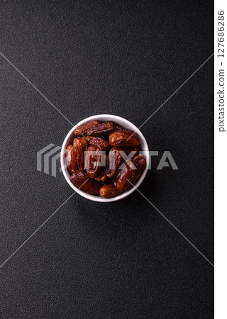 Dried tropical date fruit as an ingredient for fresh organic diet food 127686286