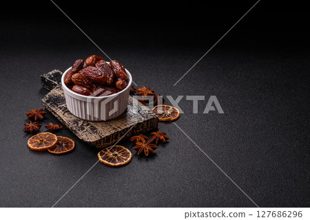 Dried tropical date fruit as an ingredient for fresh organic diet food 127686296