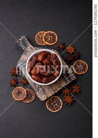 Dried tropical date fruit as an ingredient for fresh organic diet food 127686298