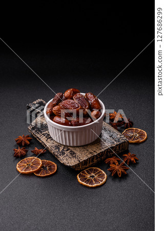 Dried tropical date fruit as an ingredient for fresh organic diet food Dried tropical date fruit as an ingredient for fresh organic diet food 127686299