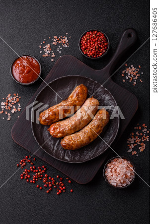 Grilled pork or beef sausages 127686405