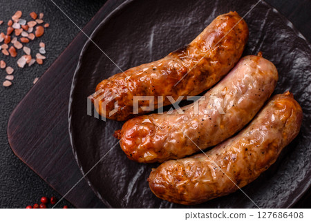 Grilled pork or beef sausages Grilled pork or beef sausages 127686408